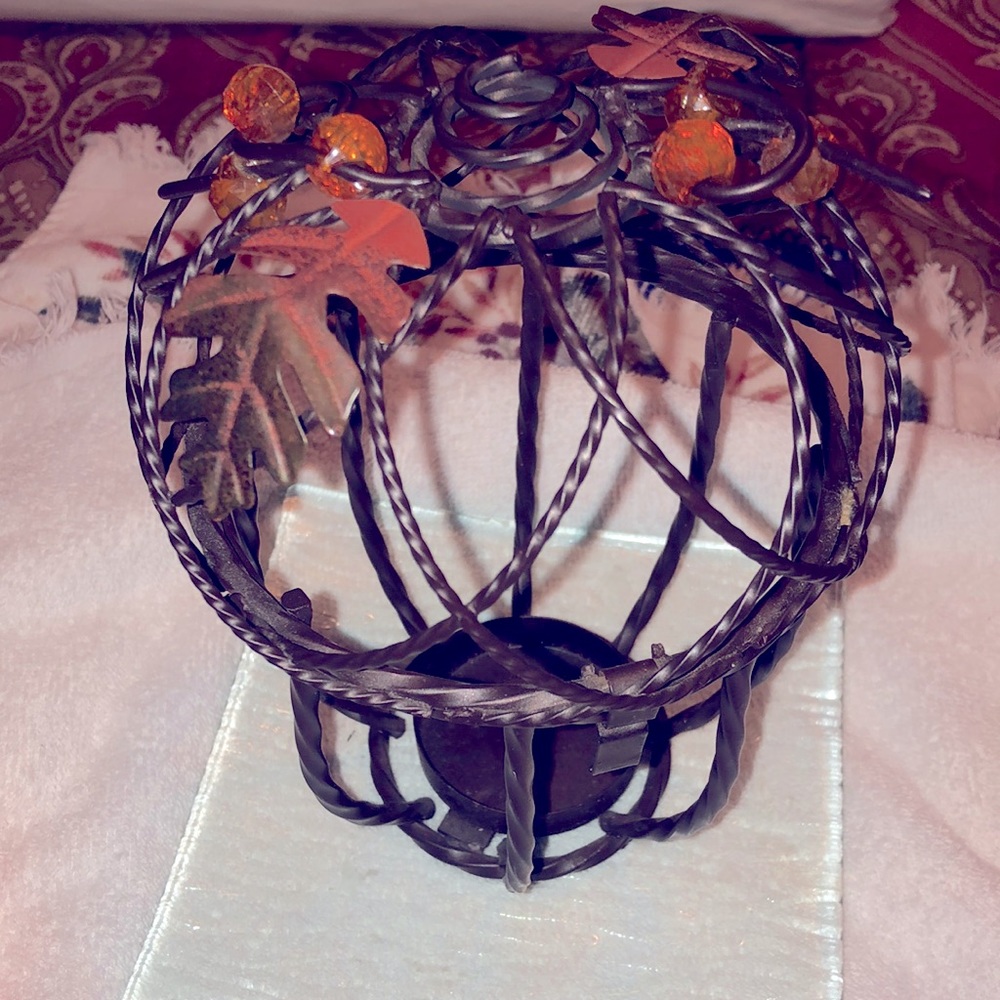 Seasonal decorative candle holder.